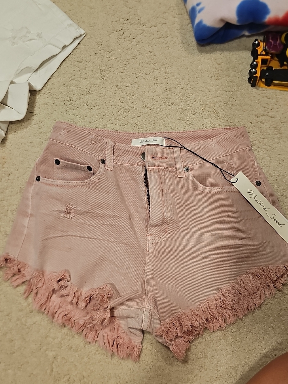Light Pink High Waisted Jean Shorts With Some Fringe